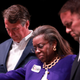 Virginia Republican gubernatorial candidate Glenn Youngkin, Republican candidate for lieutenant governor Winsome Sears and Republican attorney general candidate Jason Miyares pray during a worship service at the Highlands Fellowship Church on October 31, 2021 in Abingdon, Virginia.